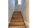 A stairway under construction with wood steps and drywall walls at 1435 17Th N Ave, St Petersburg, FL 33704
