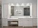 Elegant bathroom with double vanities, marble countertops, and decorative mirror, perfect for relaxation at 17124 Crawley Rd, Odessa, FL 33556