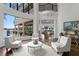Open-concept living space with views of the pool, lake, and other areas of the house at 17124 Crawley Rd, Odessa, FL 33556