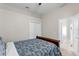 Bedroom featuring a ceiling fan, double door closet and ensuite bathroom at 17318 Emerald Chase Dr, Tampa, FL 33647