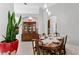 Dining room area featuring neutral decor, tile flooring, and seamless flow to other rooms at 17318 Emerald Chase Dr, Tampa, FL 33647