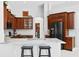 Elegant kitchen featuring custom cabinets, granite counters, modern appliances, and a center island at 17318 Emerald Chase Dr, Tampa, FL 33647