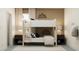 Comfortable bunk bedroom features modern bunkbeds, stylish nightstands, and trendy mountain decor for  at 18461 Serene Lake Loop, Lutz, FL 33548