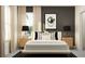 Stylish bedroom features a modern bed with decorative pillows, sleek nightstands, and contemporary decor at 18461 Serene Lake Loop, Lutz, FL 33548