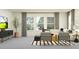 Bright living room with modern furniture, stylish decor, large windows, and natural light at 18461 Serene Lake Loop, Lutz, FL 33548