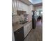 Well-maintained kitchen with granite countertops and stainless steel appliances at 1898 Shore S Dr # 311, South Pasadena, FL 33707