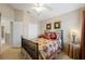 Comfortable bedroom with carpet flooring and natural light from the window at 20039 Heritage Point Dr, Tampa, FL 33647