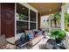 Welcoming front porch with comfortable seating and stylish outdoor decor at 20039 Heritage Point Dr, Tampa, FL 33647