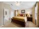 Inviting main bedroom with a plush bed, neutral walls, and vaulted ceiling at 20039 Heritage Point Dr, Tampa, FL 33647