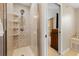 Updated shower with glass door and unique tile design with built-in shelves at 20039 Heritage Point Dr, Tampa, FL 33647