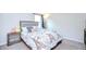 Bedroom with carpet, a ceiling fan, and an Eiffel Tower-themed bedding set on a queen-size bed at 2020 Elk Spring Dr, Brandon, FL 33511