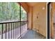 Balcony with railings overlooking wooded areas at 2220 Chianti Pl # 8-0828, Palm Harbor, FL 34683