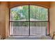 A screened lanai offers wooded and shaded views at 2220 Chianti Pl # 8-0828, Palm Harbor, FL 34683