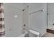 Bathroom with shower-tub combination and white tiled walls and a showerhead at 2220 Chianti Pl # 8-0828, Palm Harbor, FL 34683