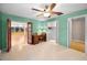 This charming bedroom boasts bright walls, wood-look floors, with an adjacent office space and closet at 2485 Indigo Dr, Clearwater, FL 33763