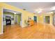Open-concept living space with a kitchen, sunroom, and ample lighting at 2485 Indigo Dr, Clearwater, FL 33763