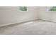 Empty bedroom with neutral carpet and natural light at 2814 W Humphrey St, Tampa, FL 33614