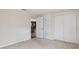 Bedroom with built-in storage cabinets and open doorway at 2814 W Humphrey St, Tampa, FL 33614