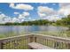 Bench seating overlooks the lily pad covered lake at 2814 W Humphrey St, Tampa, FL 33614