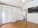 Spacious bedroom features hardwood floors and ample closet space at 3001 Regal Oaks Blvd, Palm Harbor, FL 34684
