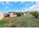 Expansive backyard offers ample space for outdoor activities and relaxation at 3243 Eisenhower Dr, Holiday, FL 34691