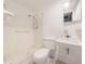 Bathroom with tile shower and sink at 3243 Eisenhower Dr, Holiday, FL 34691