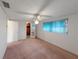 Bedroom with window and closet at 3243 Eisenhower Dr, Holiday, FL 34691