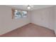 Cozy bedroom with a window and ceiling fan, perfect for relaxation at 3243 Eisenhower Dr, Holiday, FL 34691