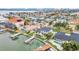 Breathtaking aerial view of waterfront homes with private docks, pools, and scenic waterways at 330 Palm Ne Is, Clearwater Beach, FL 33767