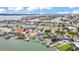 Waterfront homes offer boat docks and stunning views of the bay and cityscape in this coastal community at 330 Palm Ne Is, Clearwater Beach, FL 33767