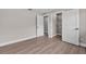 Clean, empty bedroom showcasing the open closet and the natural light streaming in at 330 Palm Ne Is, Clearwater Beach, FL 33767