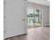 Bedroom with a door leading to a scenic view of the water at 330 Palm Ne Is, Clearwater Beach, FL 33767