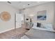 Cozy bedroom featuring a comfortable bed, stylish decor, and a doorway leading to other parts of the house at 330 Palm Ne Is, Clearwater Beach, FL 33767