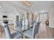 Open floor plan with dining room and staircase leading to the upper level at 330 Palm Ne Is, Clearwater Beach, FL 33767
