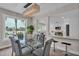 Dining room with waterfront views, designer lighting, and seating for six at 330 Palm Ne Is, Clearwater Beach, FL 33767