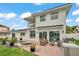 Exterior elevation with a pool, patio, and outdoor kitchen at 330 Palm Ne Is, Clearwater Beach, FL 33767