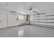 Spacious garage featuring epoxy flooring, air conditioning, and an automatic garage door at 330 Palm Ne Is, Clearwater Beach, FL 33767