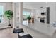 Open-concept kitchen with a breakfast bar, modern appliances, and bright white cabinetry at 330 Palm Ne Is, Clearwater Beach, FL 33767