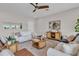 Living room with ceiling fan, luxury furniture and decor at 330 Palm Ne Is, Clearwater Beach, FL 33767