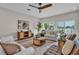Living room features contemporary furniture and large windows with great views at 330 Palm Ne Is, Clearwater Beach, FL 33767