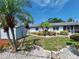 Charming home has a storage shed and beautiful landscaping at 3357 Hunt Club Dr, Clearwater, FL 33761
