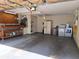 Spacious garage with laundry, utility sink, workbench, ample storage, and epoxy-coated floor at 3357 Hunt Club Dr, Clearwater, FL 33761
