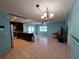 Spacious open kitchen and living area with tile flooring and an open concept at 3357 Hunt Club Dr, Clearwater, FL 33761
