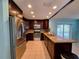 Modern kitchen featuring stainless steel appliances, granite countertops, and abundant cabinet space at 3357 Hunt Club Dr, Clearwater, FL 33761