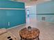 Open-concept living room showcasing tile floors and ample natural light at 3357 Hunt Club Dr, Clearwater, FL 33761