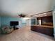 Open-concept living space with tile flooring and neutral decor at 3357 Hunt Club Dr, Clearwater, FL 33761