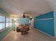 Spacious living room with bright walls, tile flooring, and cozy seating at 3357 Hunt Club Dr, Clearwater, FL 33761