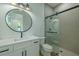 Modern bathroom features glass enclosed shower, sleek vanity, and stylish lighting at 3515 Powerline Rd, Lithia, FL 33547