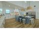Modern kitchen featuring stainless steel appliances, a center island with seating, and ample cabinet space at 3515 Powerline Rd, Lithia, FL 33547