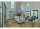 Cozy living room featuring a brick fireplace, built-in shelving, and an open floor plan at 3515 Powerline Rd, Lithia, FL 33547